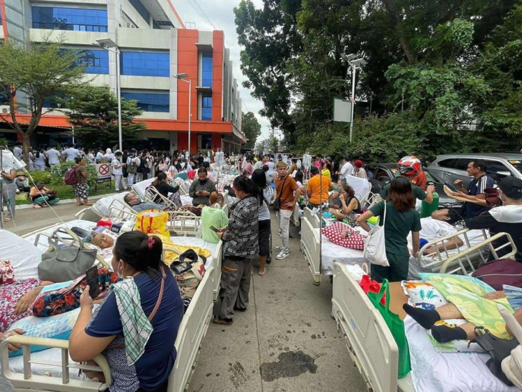 Patients are evacuated from the Southern Philippine Medical Center in Davao City. Photo by Karlo Flores/PIA Davao Region