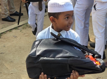 Children in Sri Lanka received a backpack full of school supplies from HSBC and A-PAD Sri Lanka to restore hope and dignity, and ensure education is prioritized amidst recovery efforts after Cyclone Ditwah. Photo: A-PAD SL