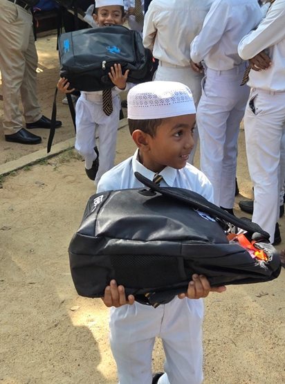 Children in Sri Lanka received a backpack full of school supplies from HSBC and A-PAD Sri Lanka to restore hope and dignity, and ensure education is prioritized amidst recovery efforts after Cyclone Ditwah. Photo: A-PAD SL