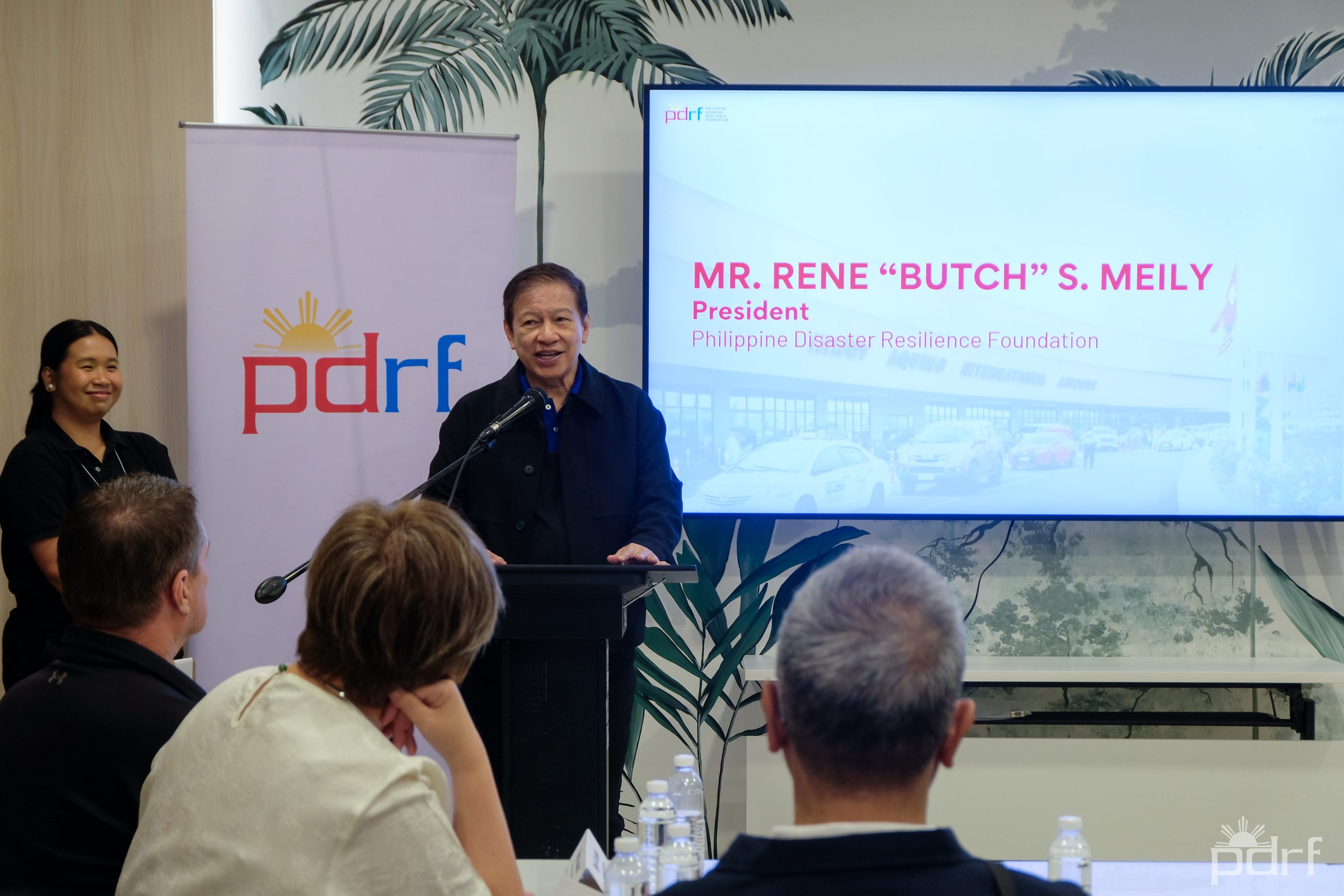 Rene โButchโ Meily, President of the Philippine Disaster Resilience Foundation, addresses the room. PDRF has now supported GARD workshops across four Philippine airports โ Clark, Cebu, Cagayan de Oro and NAIA โ and is pushing to take the same methodology to the country's smaller regional airfields. Photo credit: PDRF